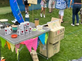 The coconut shy offered fundraising N4 mugs Mugs for sale at a festival